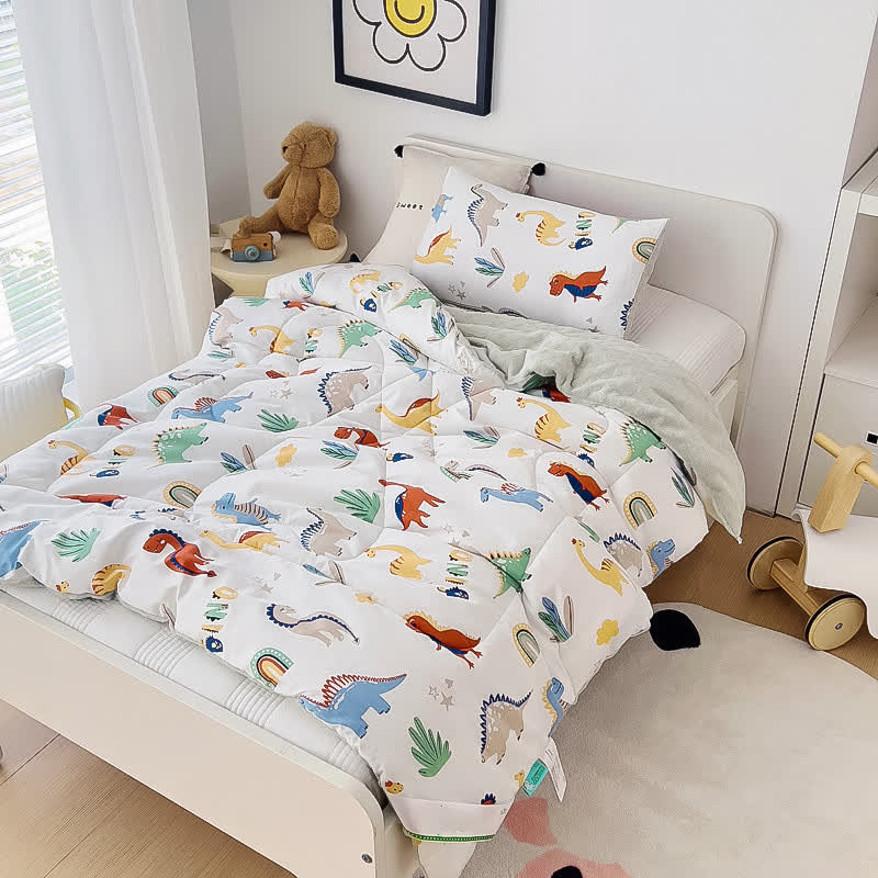 Cotton Dinosaur World Toddler Quilt